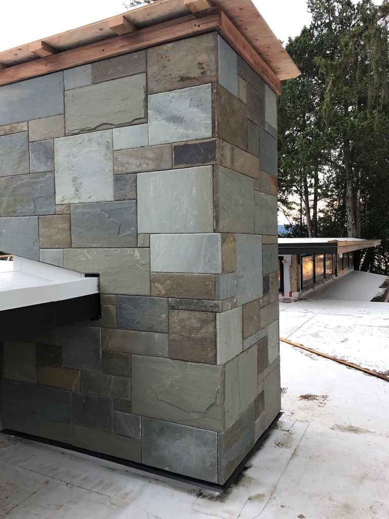 Corner detail of flagstone chimney cladding