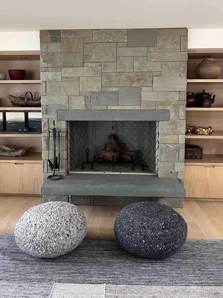 Modern slate fireplace with a herringbone-tiled firebox