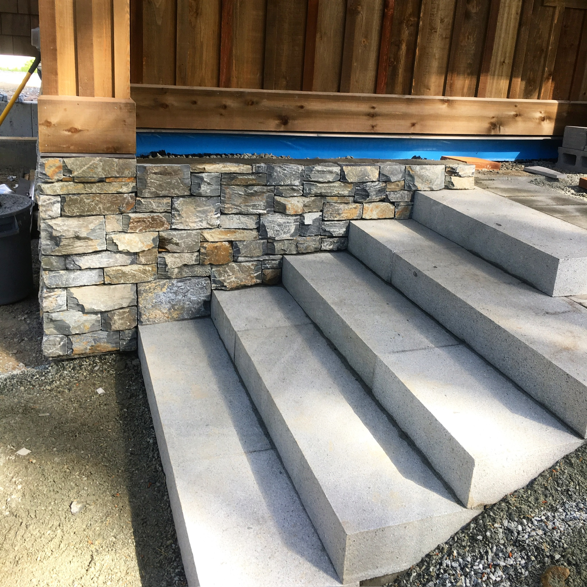 Dry-stack stone steps at a new home under construction